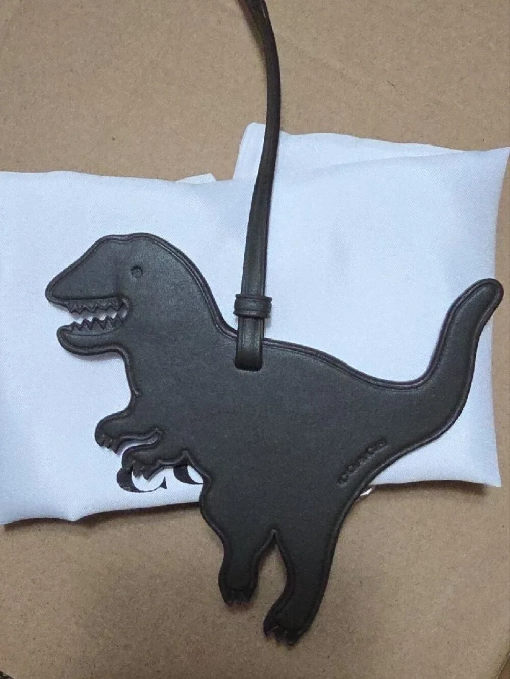 COACH Rexy Birthday Tag